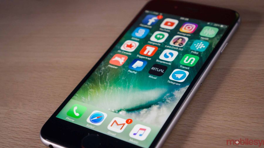 apple smartphone with screen on - third ios 10.3 beta