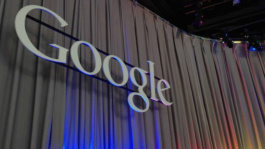 Google's logo at a press conference about google ai
