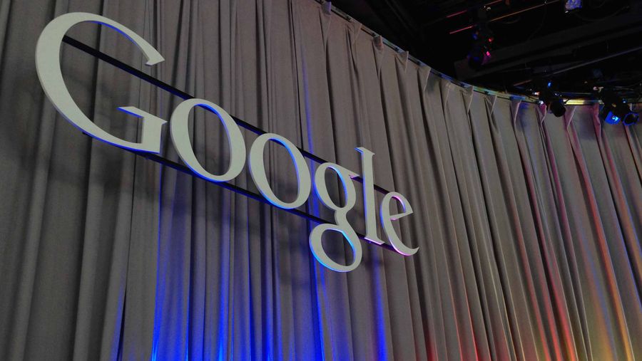 Google's logo at a press conference about google ai