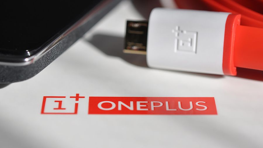 One Plus phone with charger