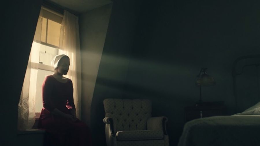 The Handmaid's Tale woman sitting