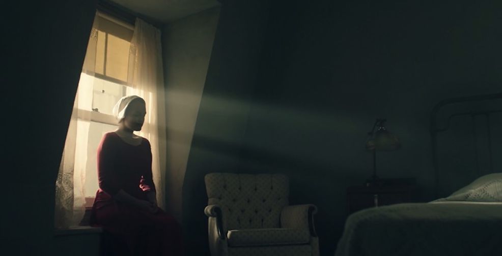 The Handmaid's Tale woman sitting