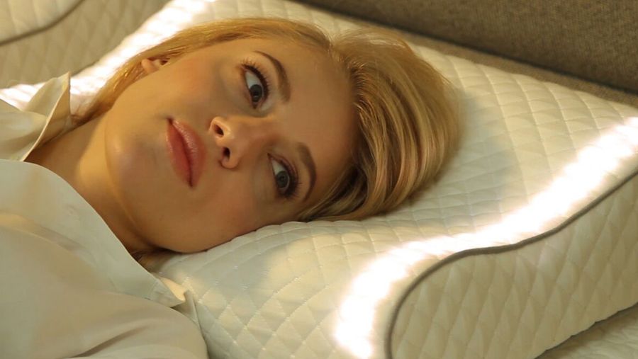sunrise smart pillow on bed
