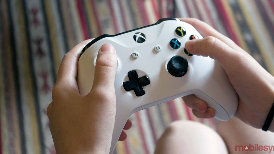 Xbox One white controller in hands