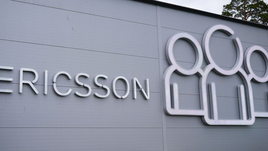 ericsson logo with people, outdoors