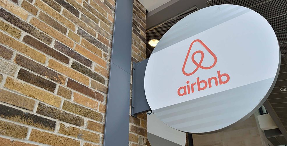 Airbnb sign on wall