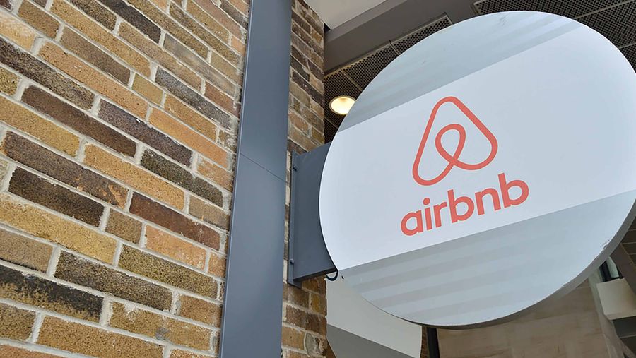 Airbnb sign on wall