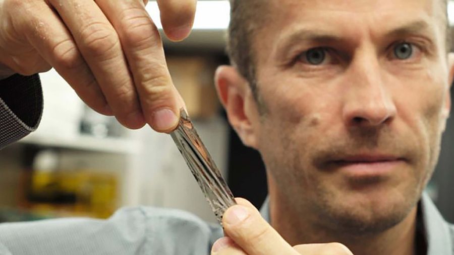 IBM scientist with storage tape