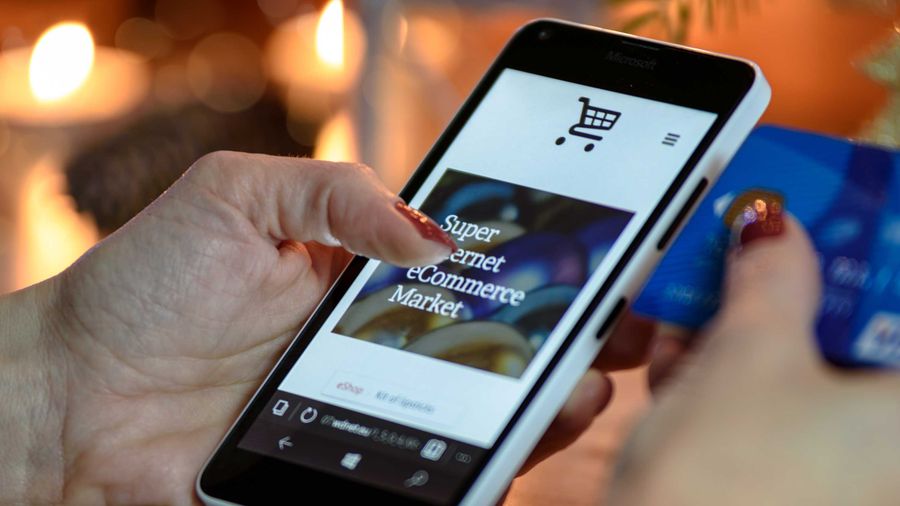 woman making purchase on phone