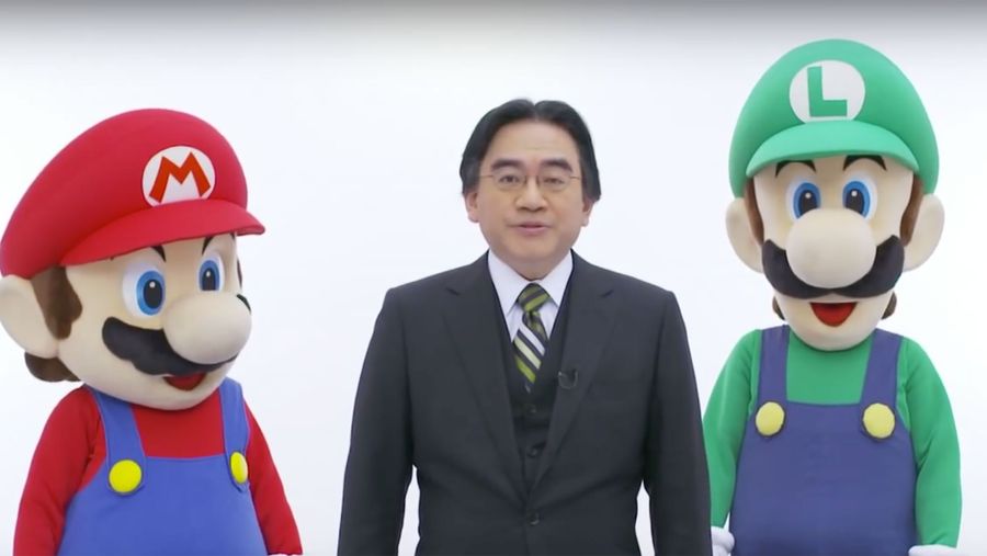 Satoru Iwata with Mario and Luigi