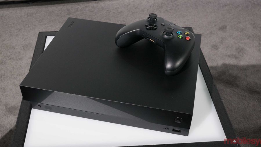 Xbox One X console with controller