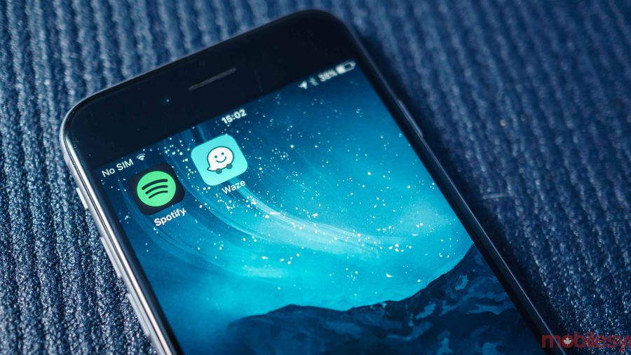 Spotify and Waze app icons on iPhone homescreen
