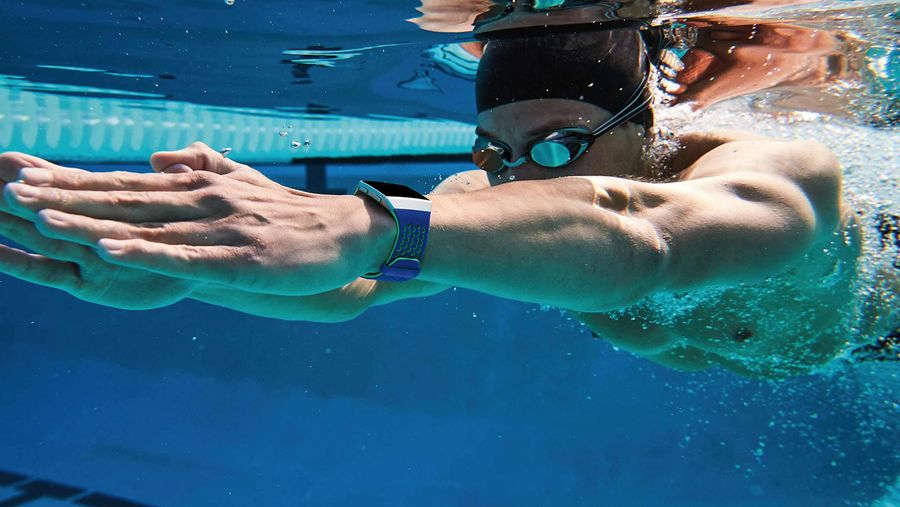 Swimmer using Fitbit Ionic smartwatch