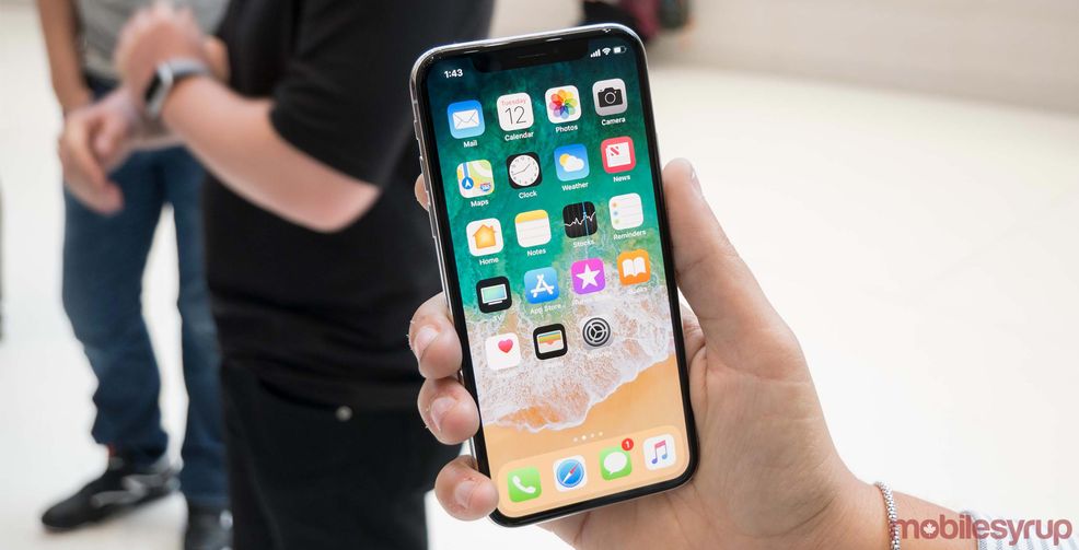 iPhone X in hands
