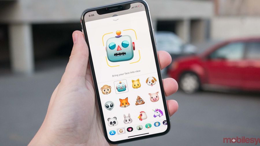 iPhone X animoji in hand
