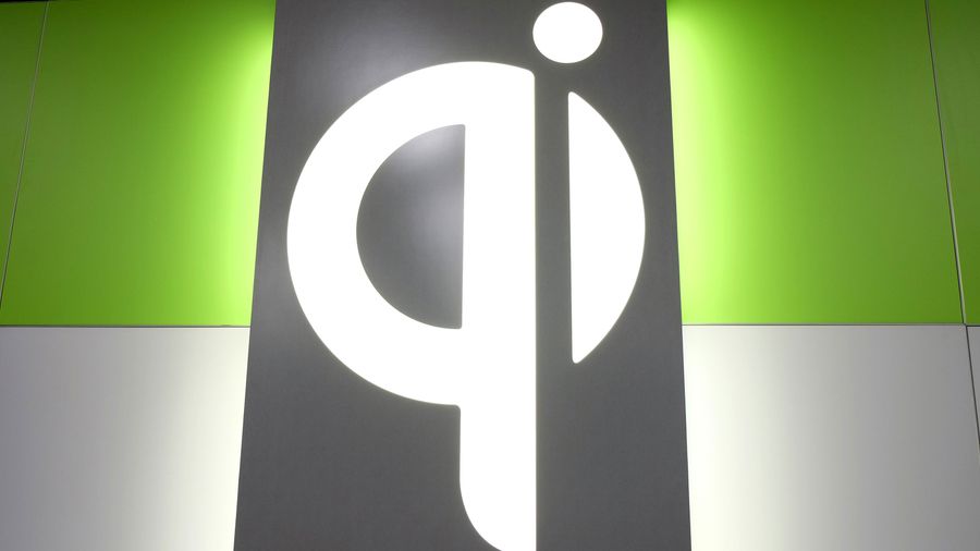 QI logo on wall at CES 2018