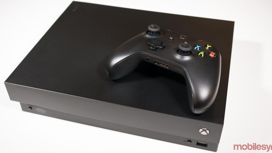 Xbox One X console with controller