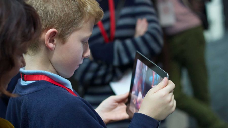 Kid with iPad