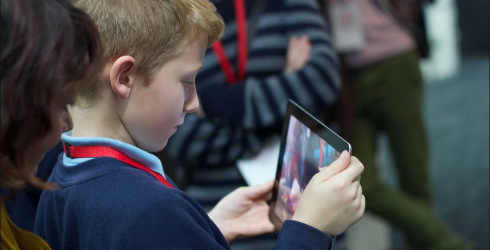 Kid with iPad