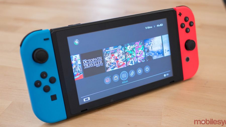 Nintendo Switch red and blue on table