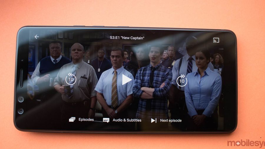 Netflix update button arrangement with Brooklyn Nine Nine in the background
