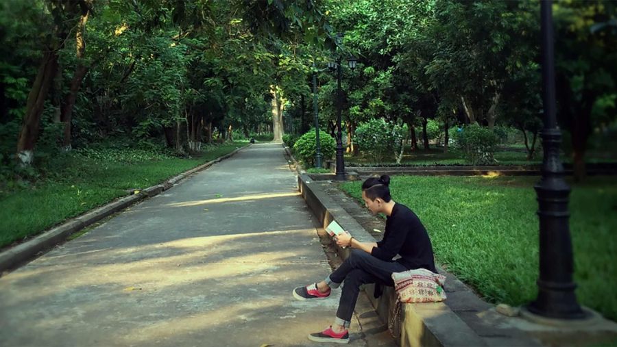 person reading in park