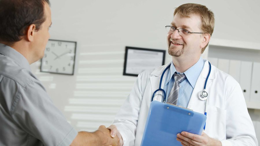 Doctor shaking patient's hand