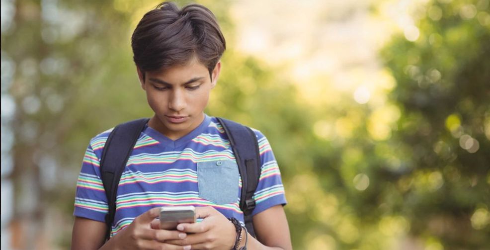 Kids Help Phone boy texting