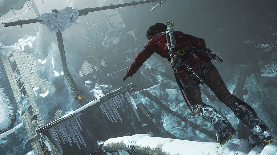 Lara carefully treads across the frozen stern of a derelict ship, which has made its way into a huge, icy cavern.