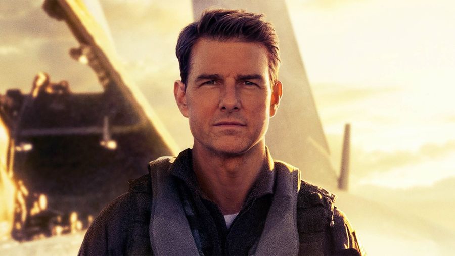 Top Gun: Maverick poster featuring Tom Cruise walking on a carrier with the sun and a plane behind him.