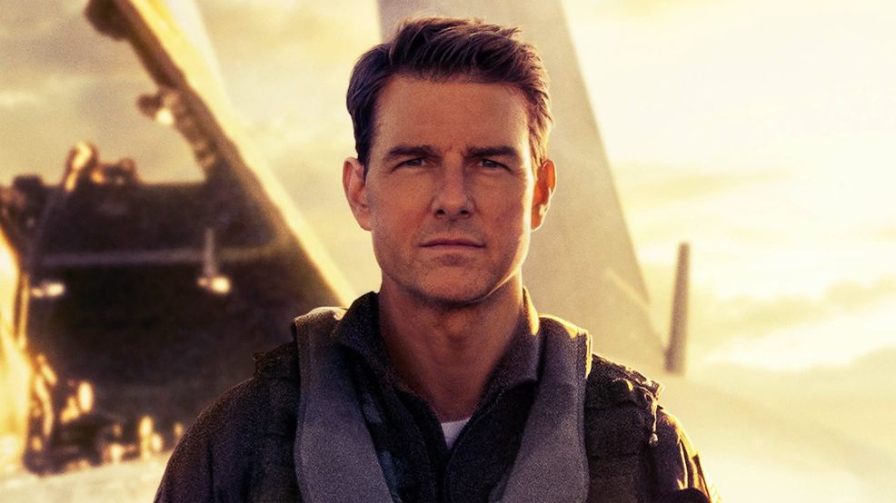 Top Gun: Maverick poster featuring Tom Cruise walking on a carrier with the sun and a plane behind him.