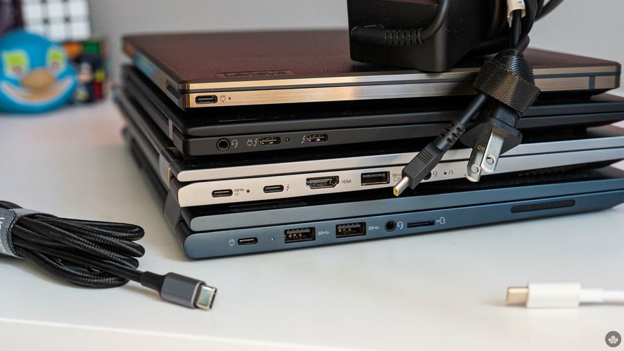 Several laptops stacked on top of each other.