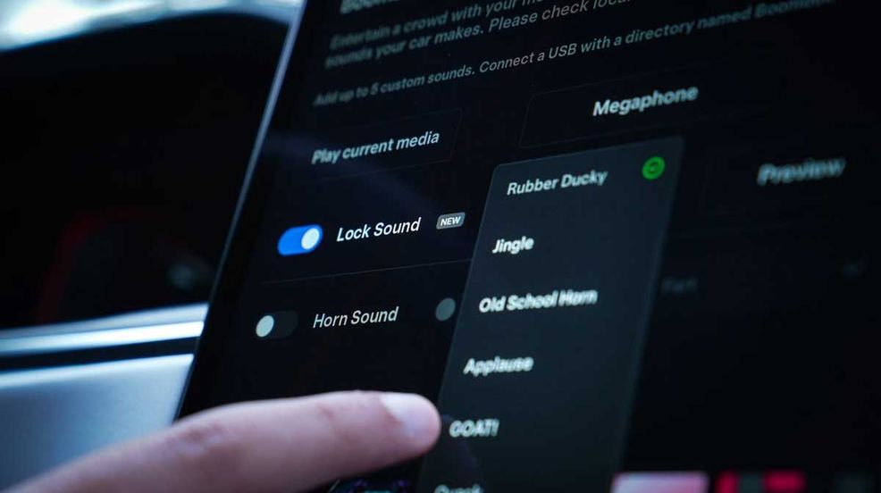 Tesla adds automatic emergency calling, Apple Podcasts and more in 2023 Holiday Update