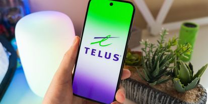 Telus logo on a smartphone.