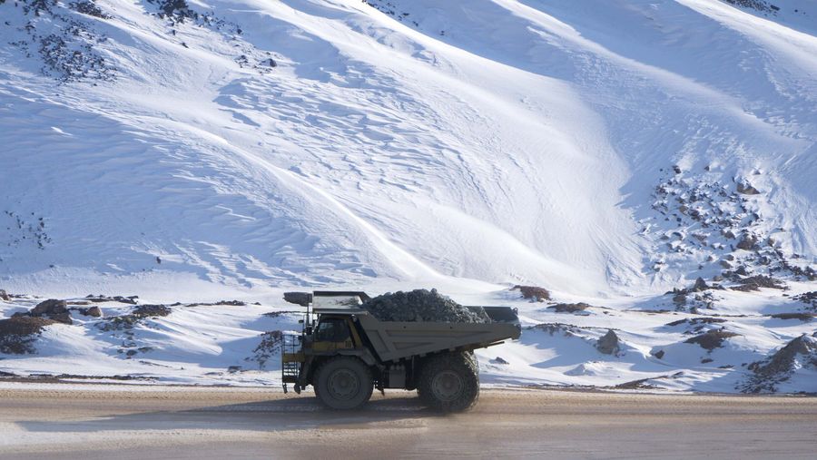 A dump truck hauling ores like nickel.