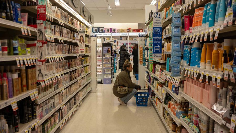 Woman shopping at London Drugs Shutterstock