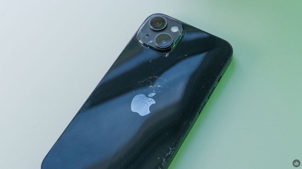 Apple iPhone with broken rear glass.