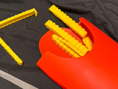 3D designed food bag clips in the shape of a McDonalds fry bag.