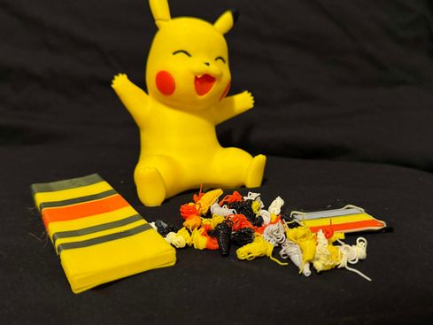 An image highlighting a 3D printed Pikachu alongside the printer poop it discarded.