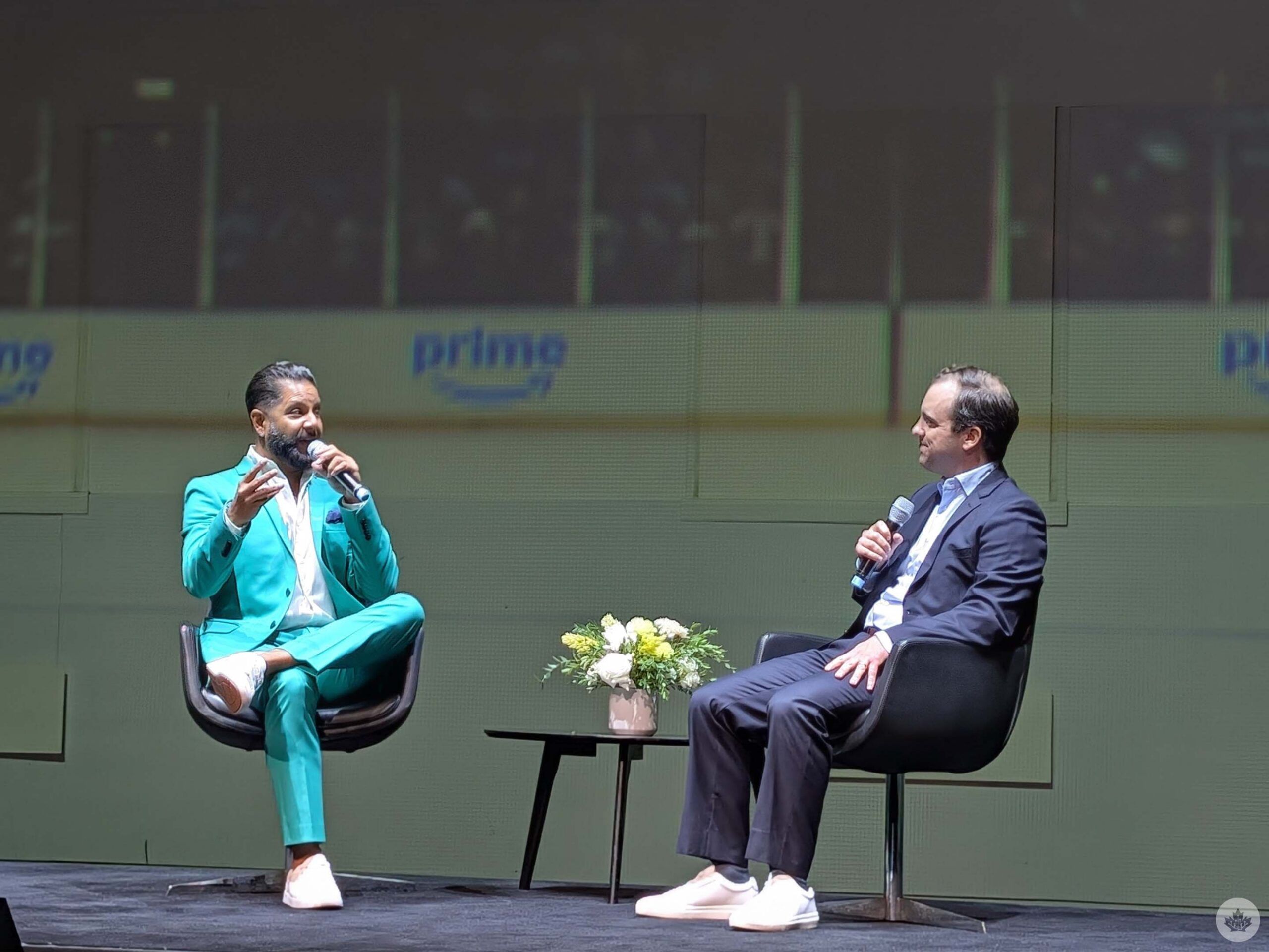 Host Devo Brown (left) speaks with Mark Shopiro (right), head of Prime Video Canada.